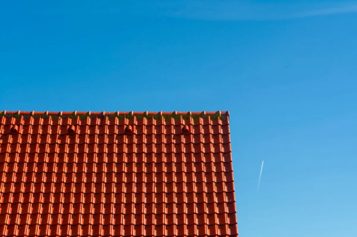 Tile roof gable in full sun, the kind of exposure that sets roof life in Minneapolis, MN